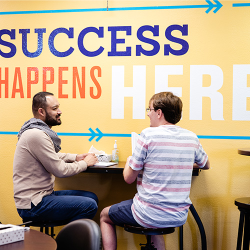 A tutor and student having a conversation