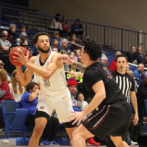 AJ Kirby playing basketball