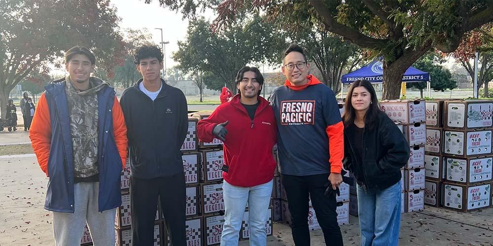 Image of Professor Lloyd Chia and students
