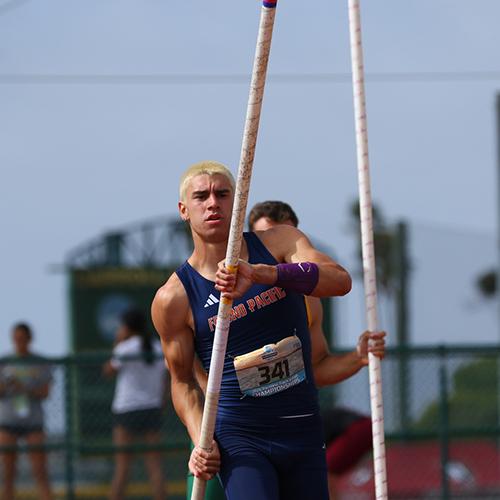 College track and field athlete competing