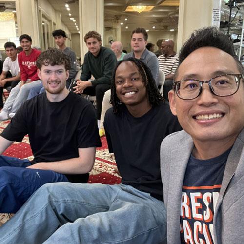 Photo of Professor Lloyd Chia and students
