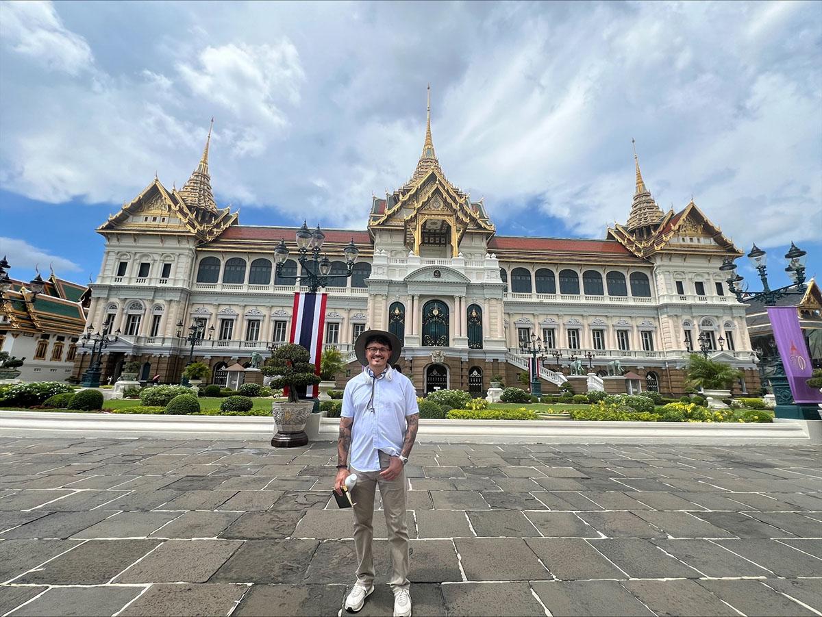 Jordan Soliz in front of a Thai temple