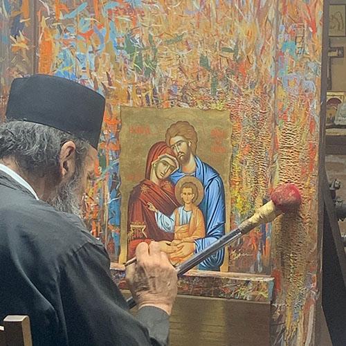 Photo of man painting in Greece