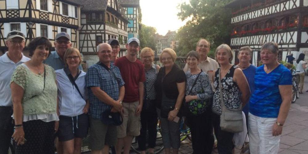 Group photo of travelers smiling