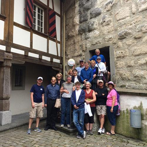 Group photo of travelers smiling