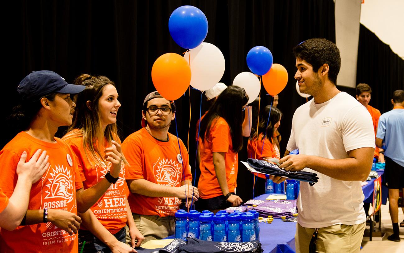 New student getting a t-shirt for orientation