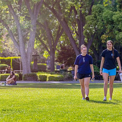 Students walking on the Campus Green