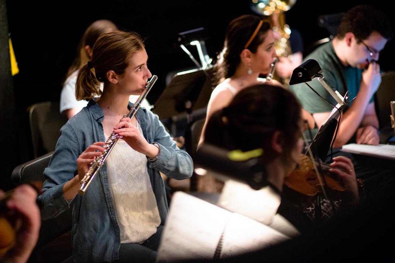 Flute player in an ensemble