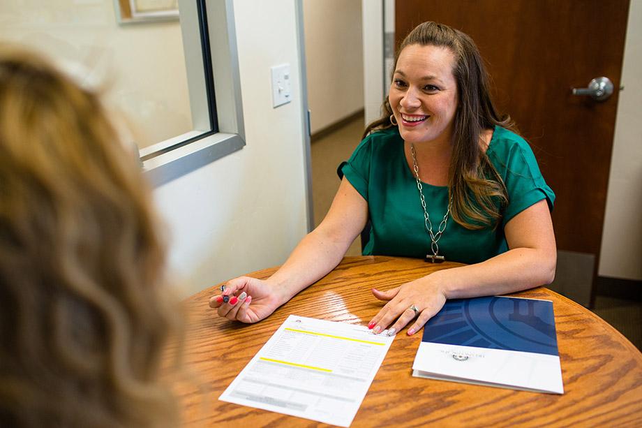 a financial aid rep guiding a student through what could be offered