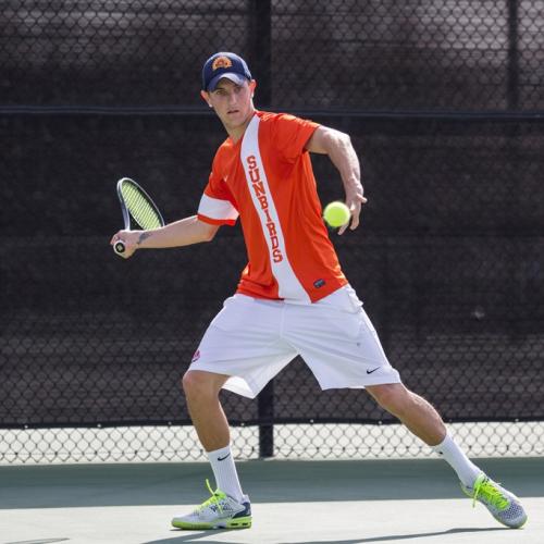 FPU tennis player about to hit the ball