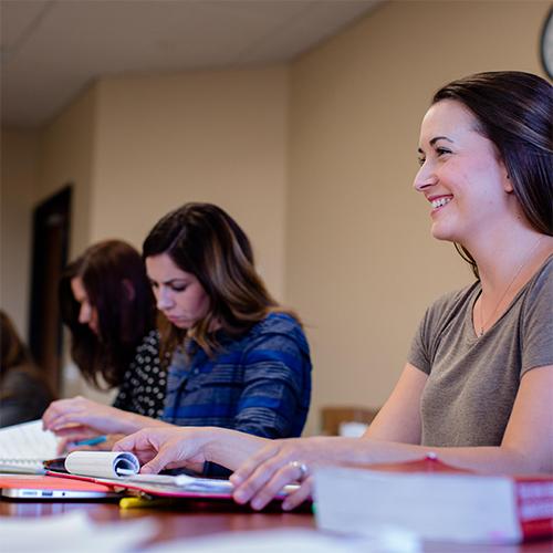 College students sitting at a desk