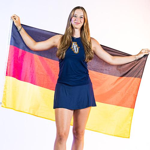Photo of student holding German flag