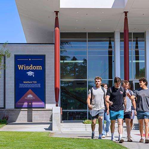 Students in front of the Warkentine Culture and Arts Center at Fresno Pacific