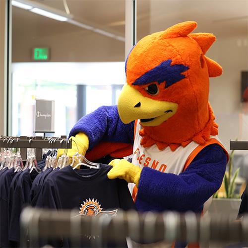 Sunny the Sunbird shopping for a shirt