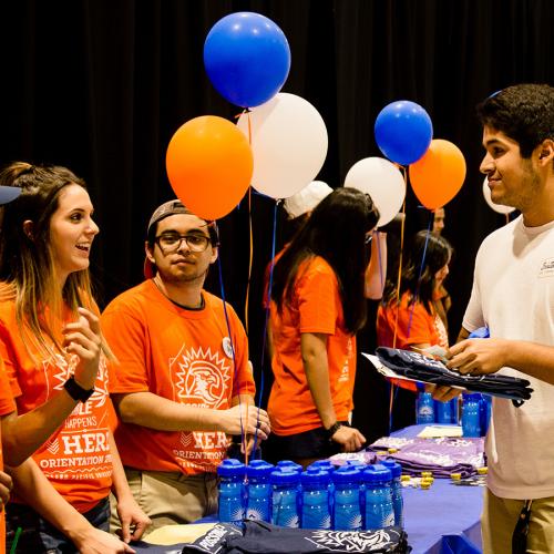 New student getting a t-shirt for orientation