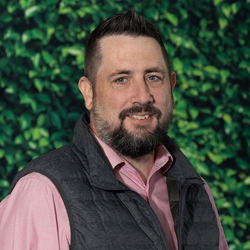 Image of a staff member smiling