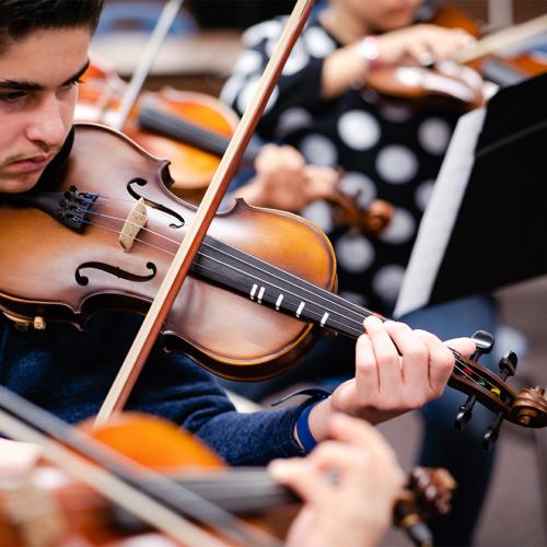 Student playing violin