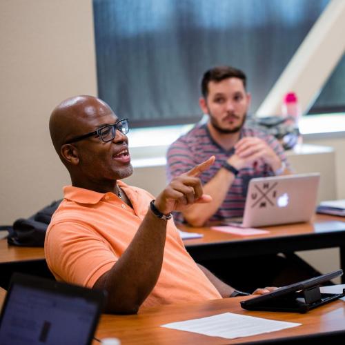 Students having a discussion in class