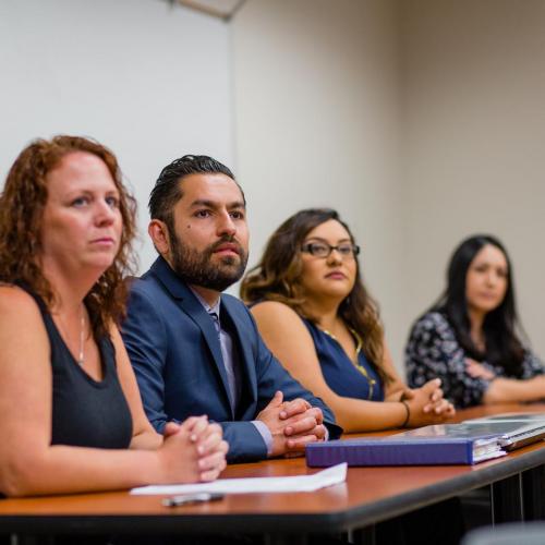 Students listening to a lecture in class