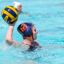 FPU water polo player passing the ball