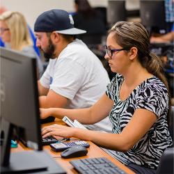 Students sitting in a computer lab