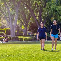 Students walking on the Campus Green