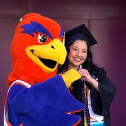 Sunny posing with a graduate